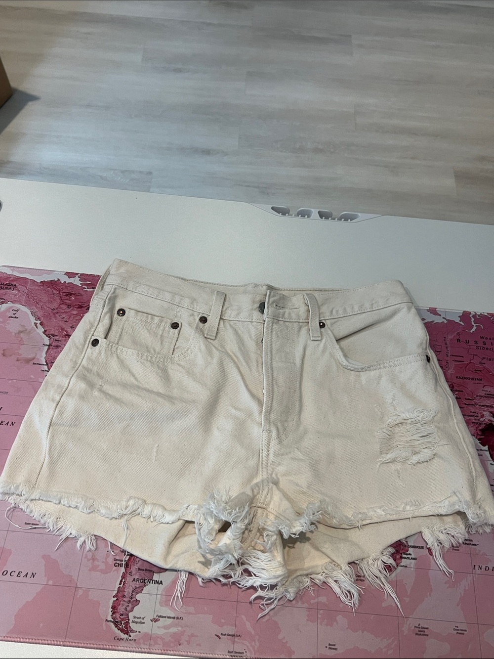 Levi’s Women’s Distressed Cream Denim Shorts